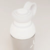 PROMIXX Ecozen Hybrid water bottle in Ceramic White / Cool Gray, translucent BPA-free Ecozen body, upper section with the flip spout open and the perforated mixing dome seated in the neck.